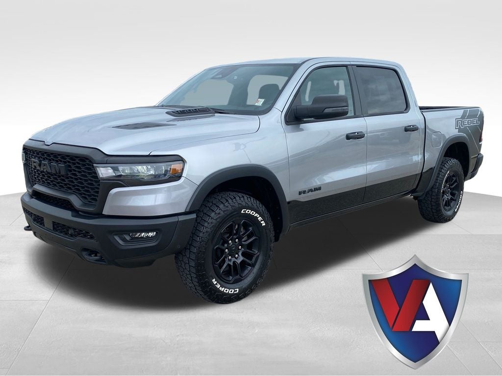 2025 RAM 1500 Rebel in Billet Silver Metallic Clearcoat — front three-quarter view