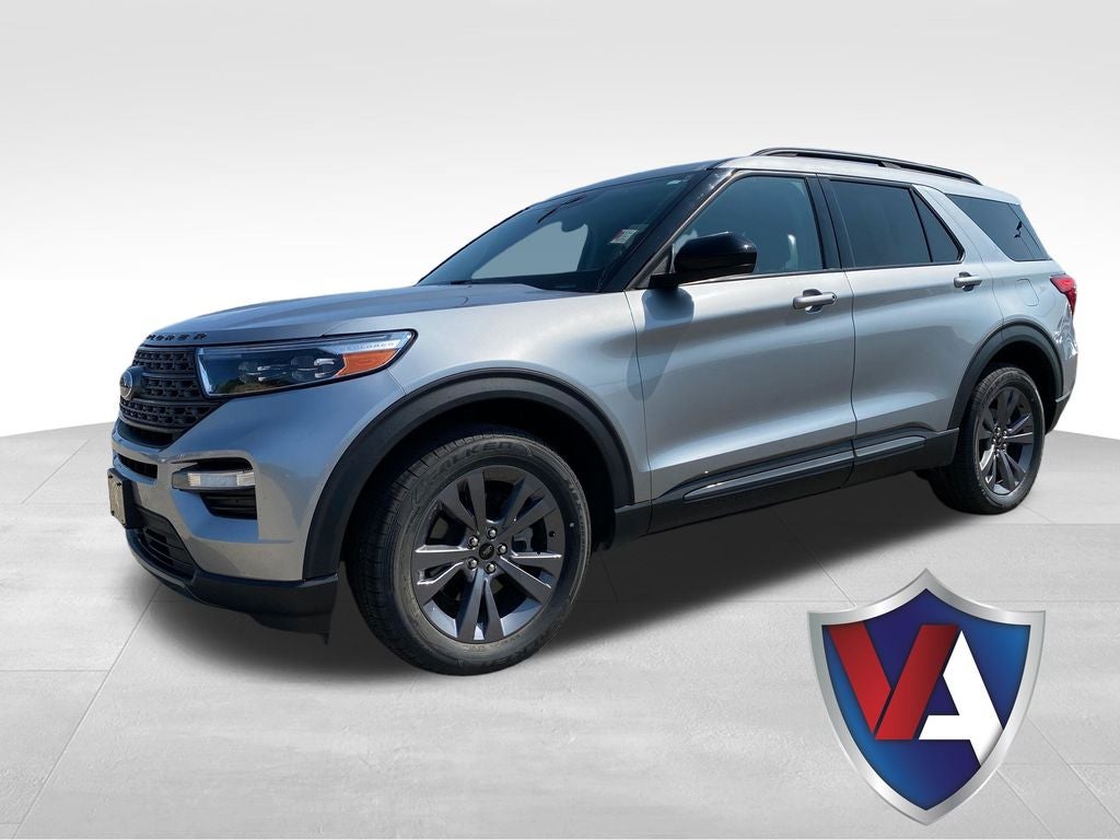 2023 Ford Explorer XLT in Iconic Silver Metallic — front three-quarter view