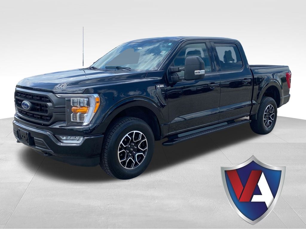 2023 Ford F-150 XLT in Black Metallic — front three-quarter view