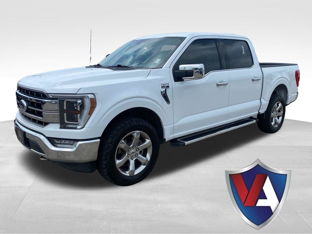 2023 Ford F-150 LARIAT in Oxford White — front three-quarter view